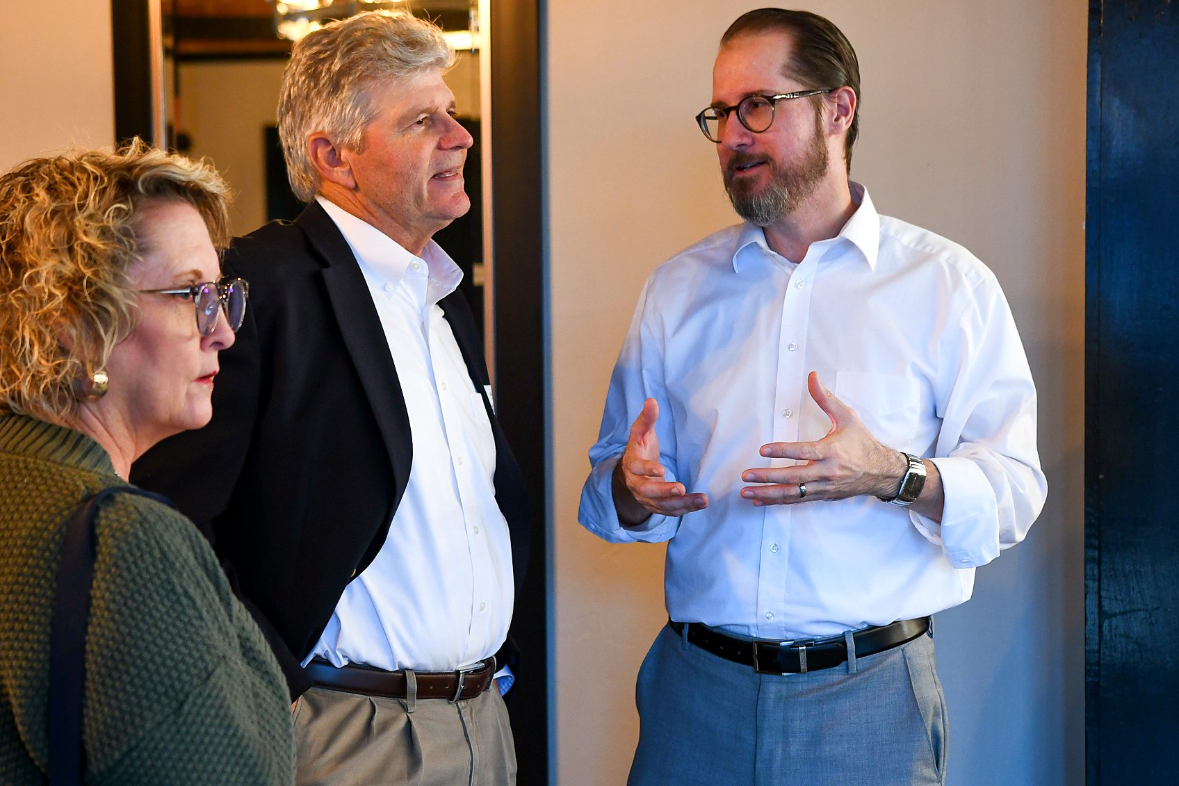 A group in conversation at the firm's 2026 annual client meeting