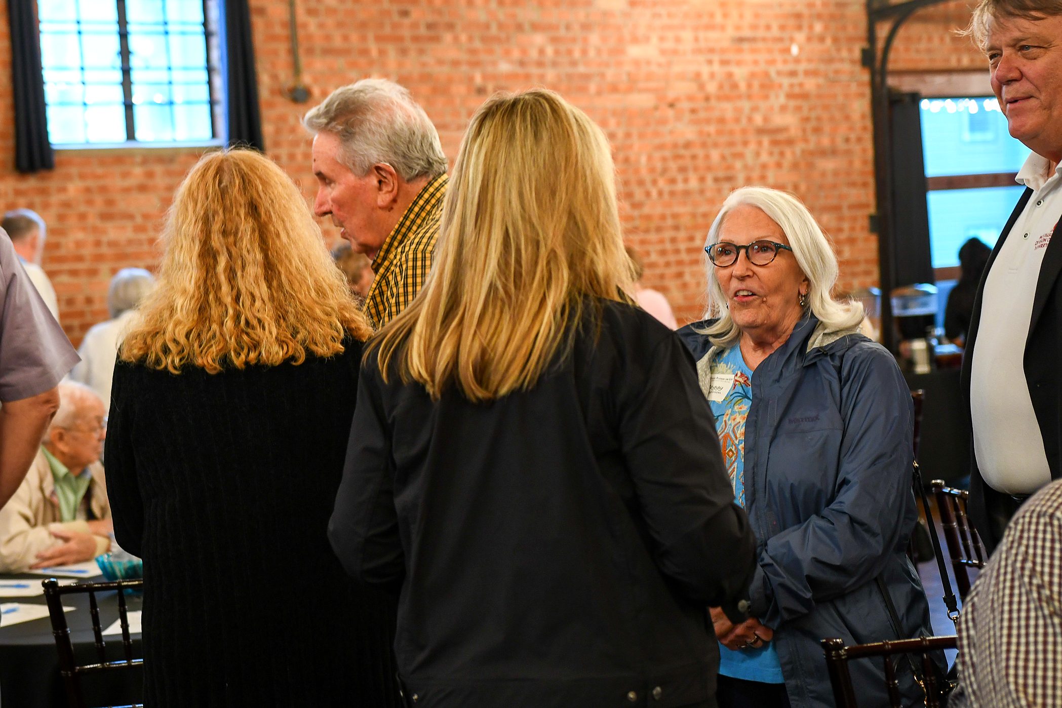 Guests catching up at the firm's 2026 annual client meeting