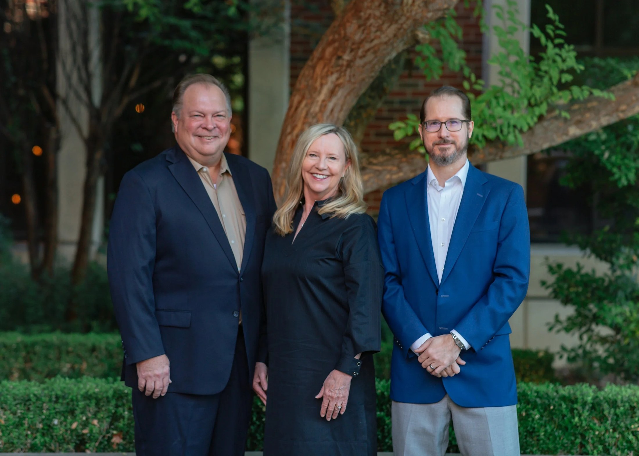 Marty Cain, Tamara Cain and Mitch Janik outside the firm