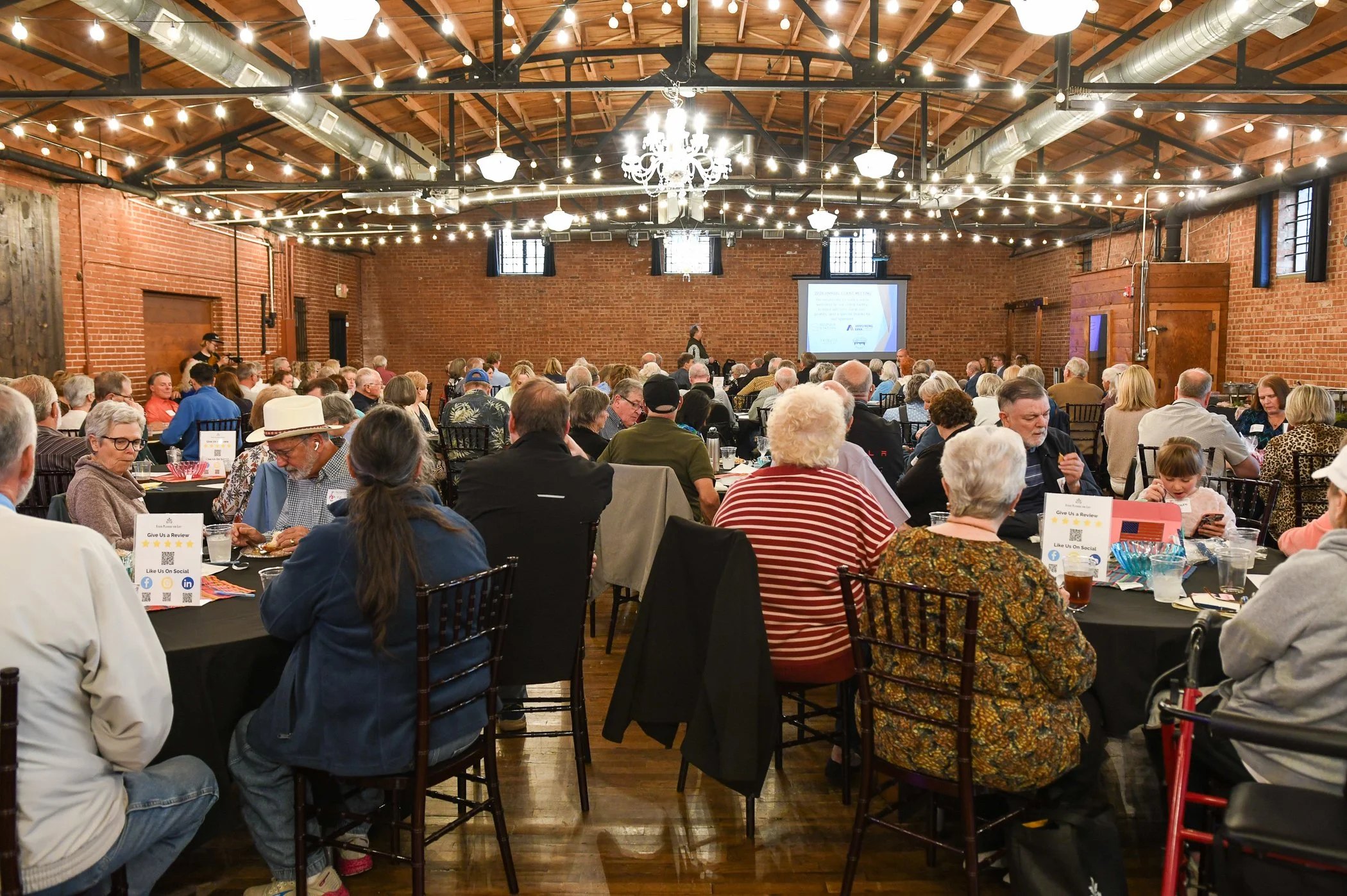 A full room of Oklahoma families at a firm workshop