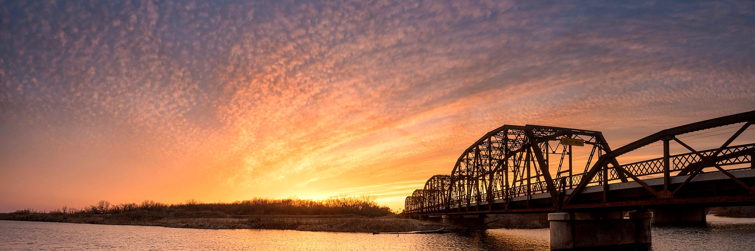 The Route 66 bridge over Lake Overholser at sunset