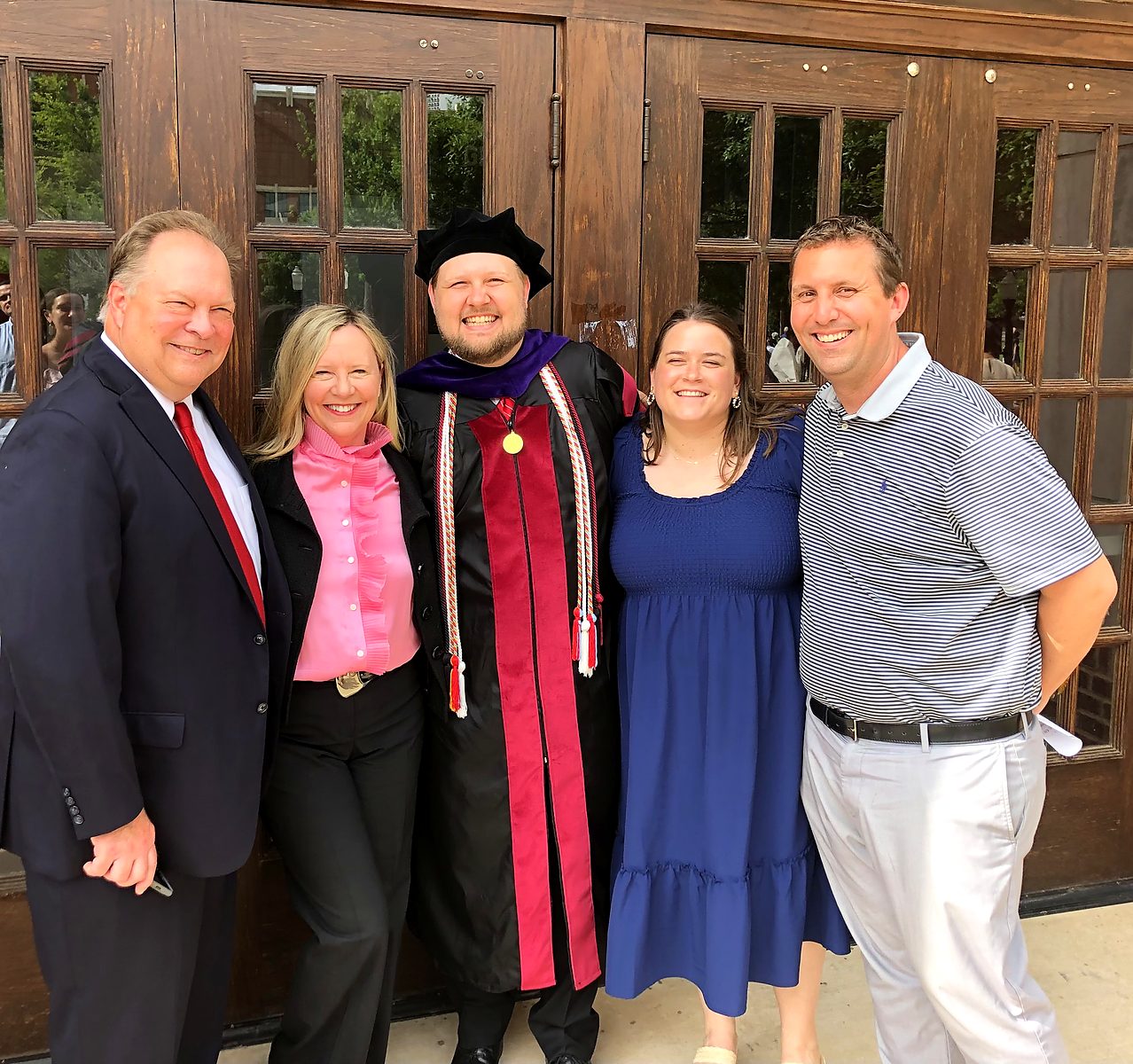 The family at a graduation, a photograph from Tamara Cain&rsquo;s own collection