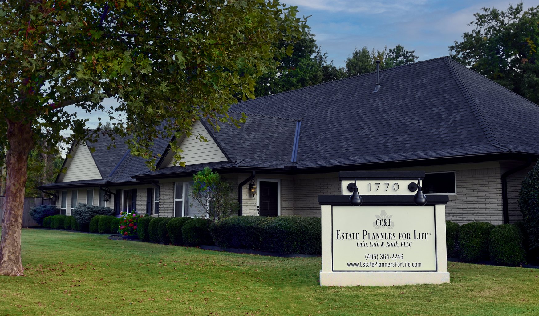 The Estate Planners for Life office at 1770 West Main Street in Norman, the Estate Planners for Life sign on the lawn